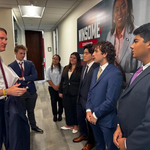 Governor Glenn Youngkin of Virginia meeting with interns, including Anouchka Ettedgui.